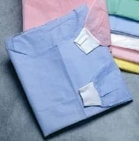Maytex Blue Isolation Gown, Knit Cuff, Latex-Free, Fluid Resistant, One Size Fits All, 50/Case - Maytex Blue Isolation Gown Knit Cuff Latex-Free Fluid Resistant Case of 50 - Image 1