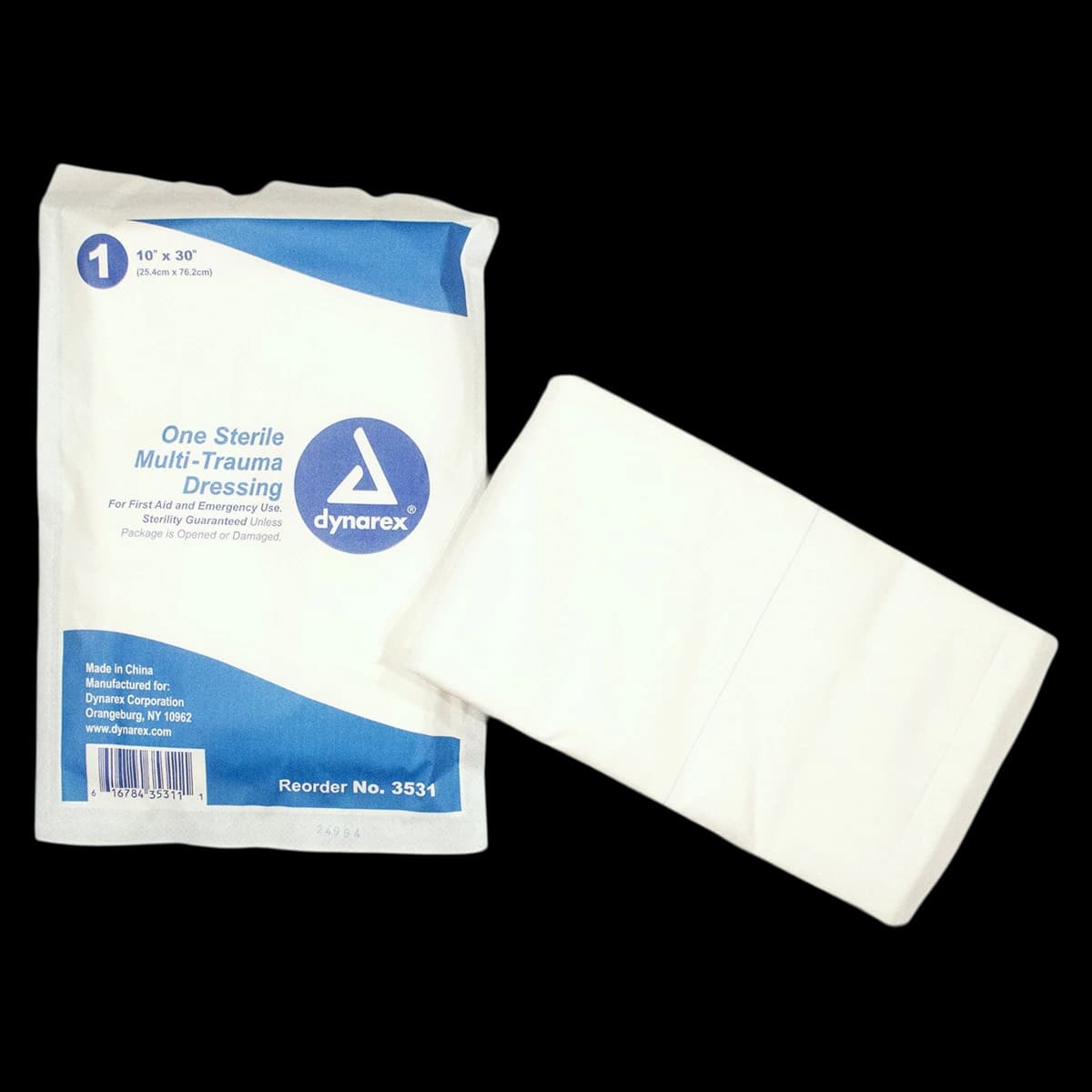 Dynarex Multi-Trauma Dressing, Fluff Filled, Sterile, 10" x 30", Adhesive - Dressing Multi-Trauma Sterile - Image 1