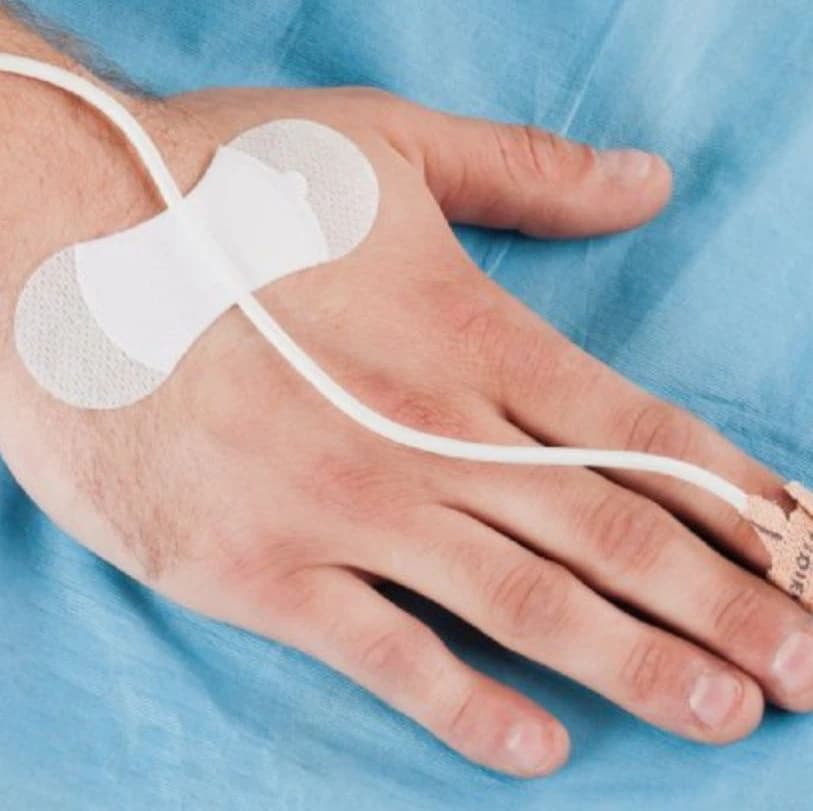 Grip-Lok Universal Securement Device, Sterile, Medium, White Loop Liner with Hook Bandage/Liner, 100/Box - Grip-Lok Universal Securement Device White Loop Liner Hook Bandage/Liner Sterile Medium 100 per Box - Image 1
