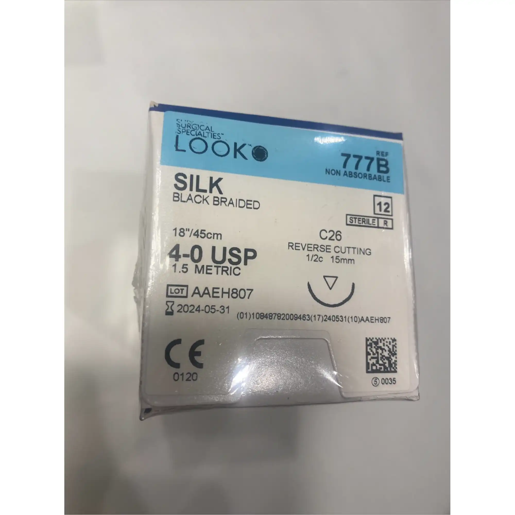 Look Sutures - Silk, 4-0, Black, 18", C26, 1/2 Circle Reverse Cutting 15mm, 12/Bx - Look Sutures - Silk, 4-0, Black, 18", C26, 1/2 Circle Reverse Cutting 15mm - Image 1