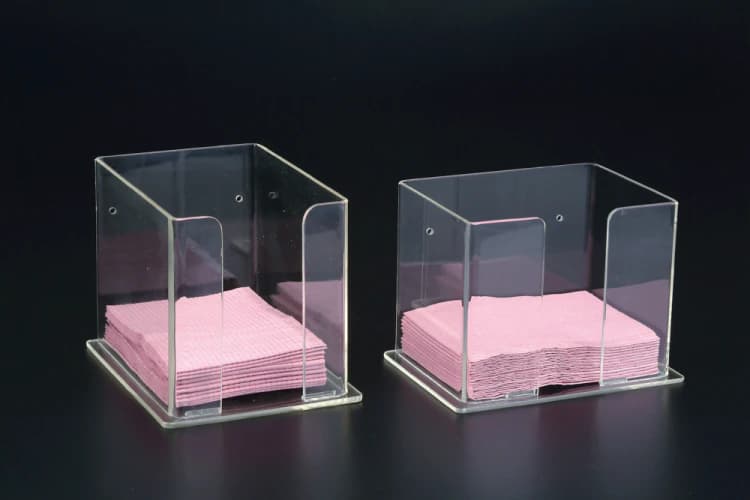 Bib Dispenser, Short-Side Loading, White Base with Clear Top, Self-Adhesive Mounting - Bib Dispenser Short-Side Loading - Image 1