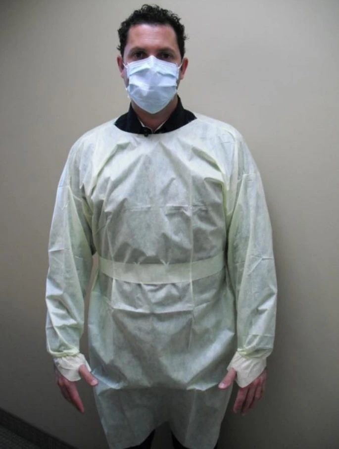 AMD Ritmed Disposable Isolation Gown, AAMI Level 2, Polypropylene, One Size Fits Most, Yellow, Elastic Round Neck, Thumb Loop Cuff, Long Sleeves, 100/Case